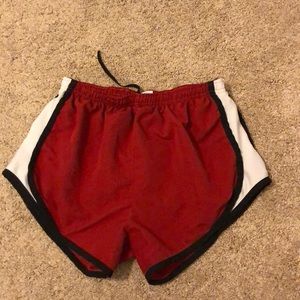 Red running / track shorts